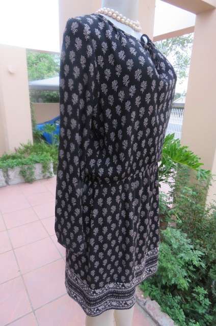 Black creased viscose/polyester fabric long sleeve dress. Blouson waist. Size 40/16.