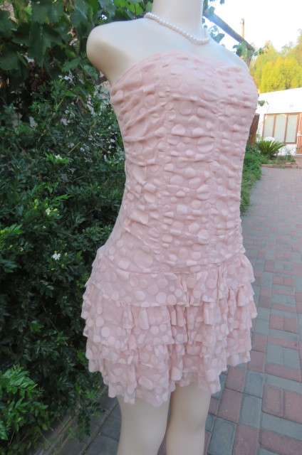 Nearly nude colour strapless mini dress size 36/12 by 'Inwear'. Stretch polyester inner.