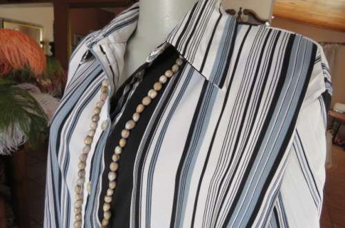 'Donatella' vertical striped long sleeve top in size 48/24 with some permanent pleats.