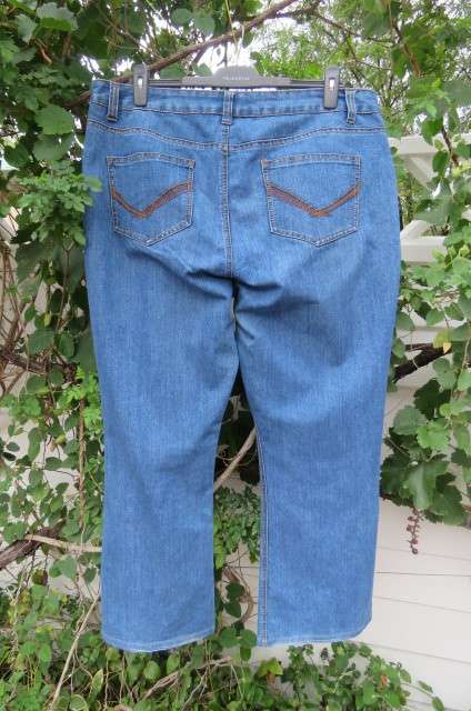 'Penny C' blue denim jeans in size 44/20. In polycotton stretch fabric. Pockets back and front.