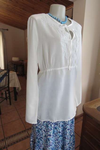 Fab. white slip over top with silver thread floral embroidery on front size 42/18 by `Real Clothing`