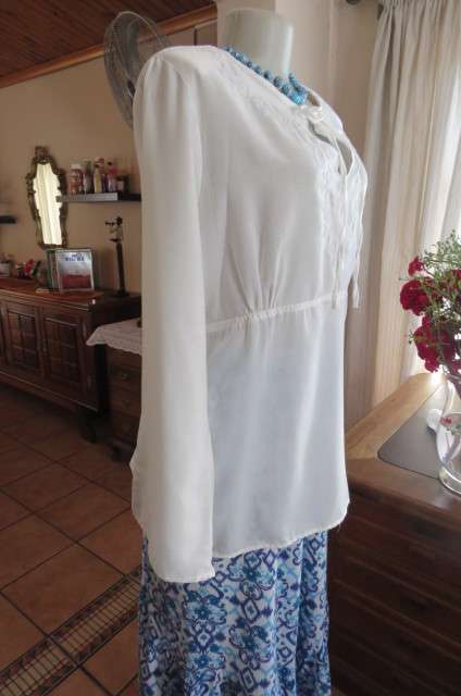 Fab. white slip over top with silver thread floral embroidery on front size 42/18 by `Real Clothing`