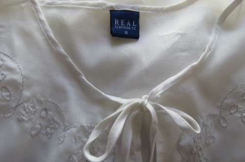 Fab. white slip over top with silver thread floral embroidery on front size 42/18 by `Real Clothing`