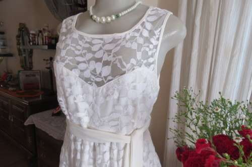 Very smart maternity dress by 'du date' in size 36/12. In very light cream cotton/nylon lace