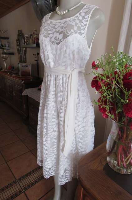 Very smart maternity dress by 'du date' in size 36/12. In very light cream cotton/nylon lace