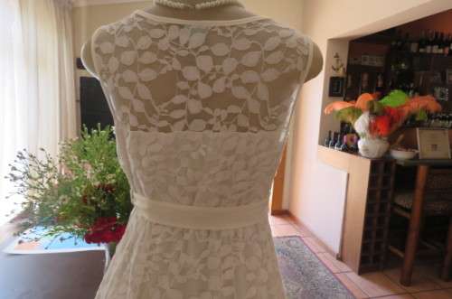 Very smart maternity dress by 'du date' in size 36/12. In very light cream cotton/nylon lace