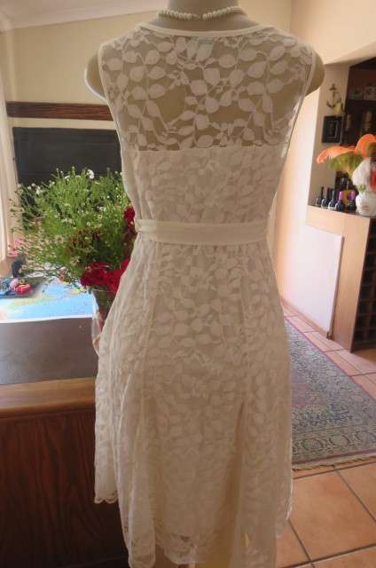 Very smart maternity dress by 'du date' in size 36/12. In very light cream cotton/nylon lace