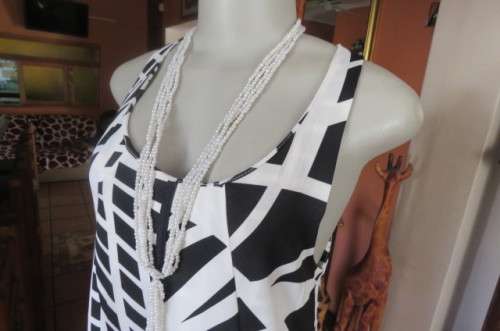 Smart  paneled monochrome maternity dress with geometric pattern.Size 34/10. As new.