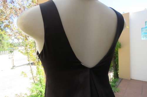 Sexy little black balloon dress by `New Look`size 32/8.Pleat at neckline back.Low V front.As new