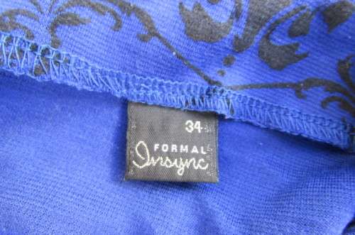 Bodycon skirt in royal blue with black baroque print in poly stretch.By`Insync Formal` size 34/10.