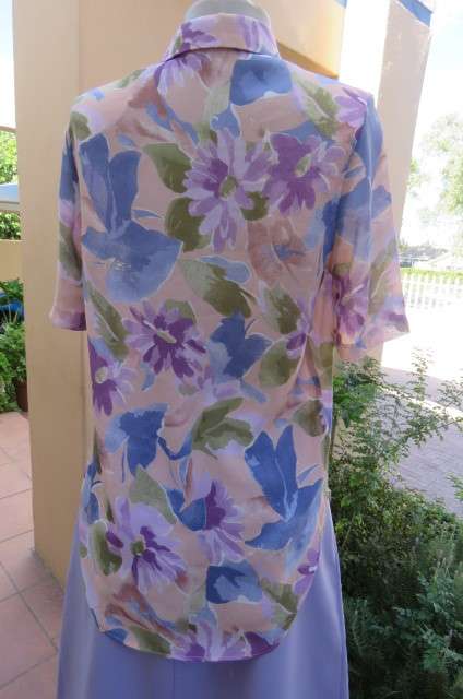 Smart dull pink with purple, blue and green floral pattern top size 34/10. Short sleeves.