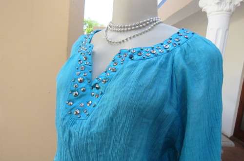 Long jade colour vertically creased with wide elasticated waist size 40/16 by 'Ella'.