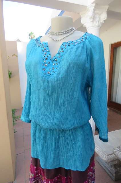 Long jade colour vertically creased with wide elasticated waist size 40/16 by 'Ella'.