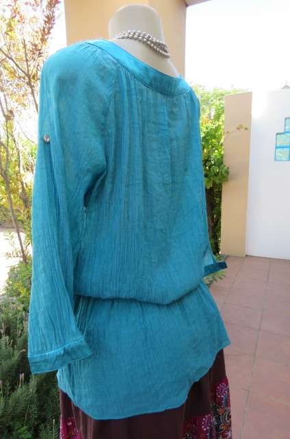 Long jade colour vertically creased with wide elasticated waist size 40/16 by 'Ella'.