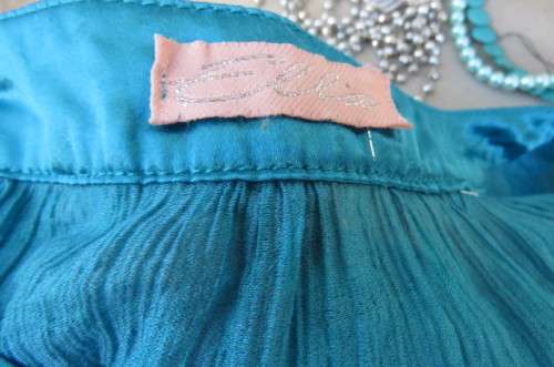 Long jade colour vertically creased with wide elasticated waist size 40/16 by 'Ella'.