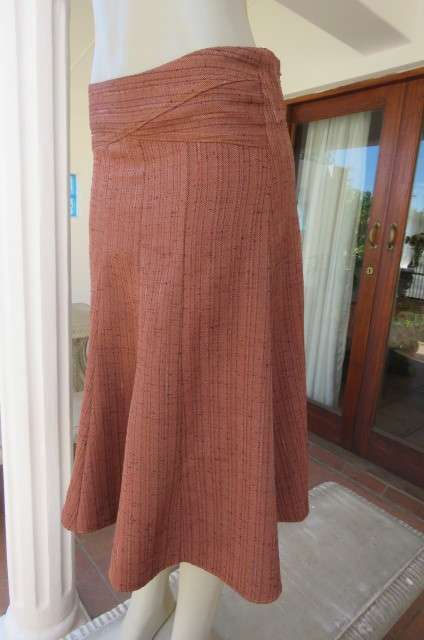Totally on trend golden brick colour paneled skirt in kick out style. Textured polycotton size 36/12