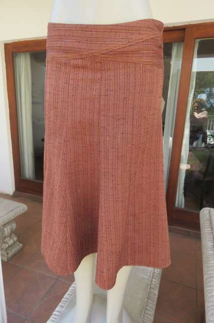 Totally on trend golden brick colour paneled skirt in kick out style. Textured polycotton size 36/12