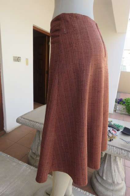 Totally on trend golden brick colour paneled skirt in kick out style. Textured polycotton size 36/12
