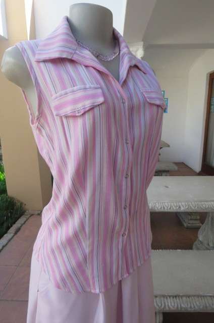 Cute pink and cream vertical striped sleeveless top in size 32/8 by INSYNC. Two dummy pockets.