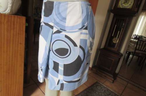 Geometric printed kneelength skirt in blues,cream and black by JEEP in size 42/18