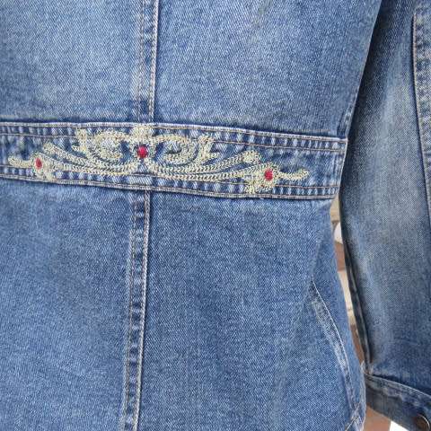 Unique denim jacket with embroidery in size 34/10.Styled with embroidered band in waist.