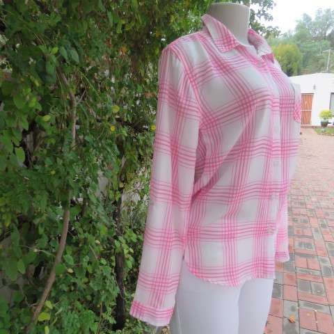 Soft and silky white and pink check long sleeve blouse in 100% polyester chiffon. Size 30 As new