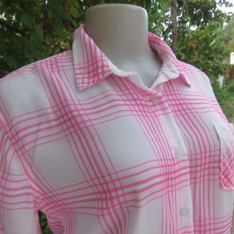 Soft and silky white and pink check long sleeve blouse in 100% polyester chiffon. Size 30 As new