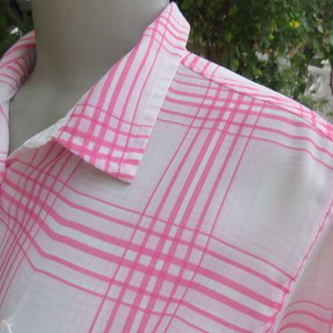 Soft and silky white and pink check long sleeve blouse in 100% polyester chiffon. Size 30 As new