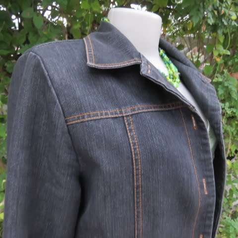 As new denim casual ong sleeve jacket by ML CLASSICS in size 36/12. Large front pockets.