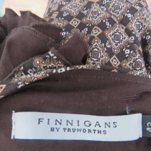 Totally on trend slip over top in size 40/16 by FINNEGANS. Leave it loose or belt it up.As new