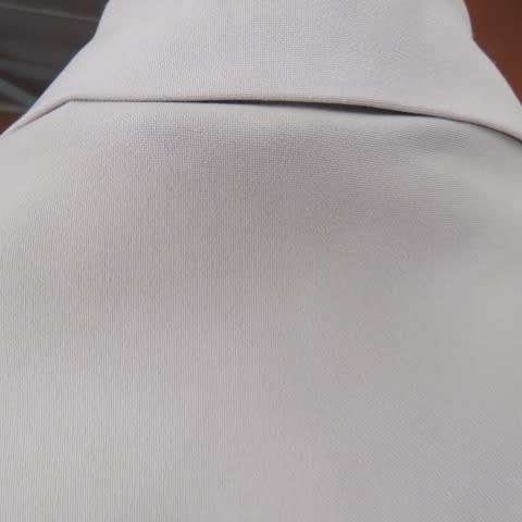 Beatiful beige sleeceless jacket closing with 2 buttons on front. Size 34/10 by INWEAR. New cond.