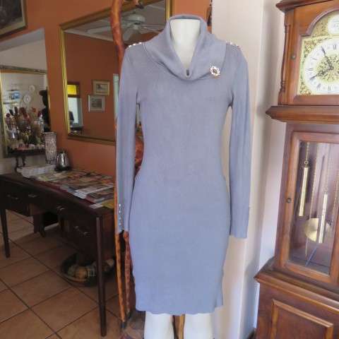 Wide poloneck knitted grey dress that will never date.In size 34/10 by NEW FEELING. As new.