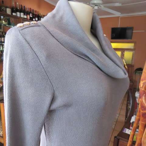 Wide poloneck knitted grey dress that will never date.In size 34/10 by NEW FEELING. As new.