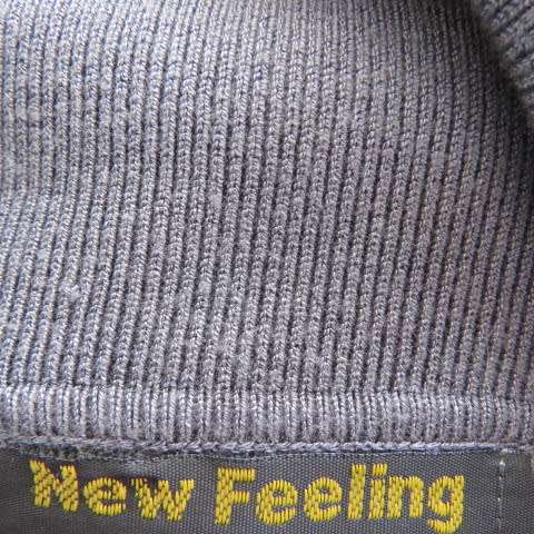 Wide poloneck knitted grey dress that will never date.In size 34/10 by NEW FEELING. As new.