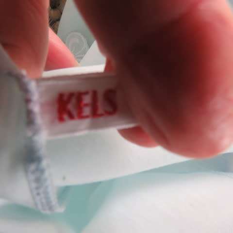 Dainty night jacket in very pale turquoise colour.By KELS in size 36/12. Loose fit. In dacron fabric