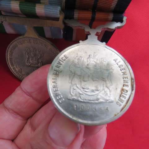 Set of 4 SADF medals with ribbons. General Service...Bronz 1994 service..Silver good service..5yr