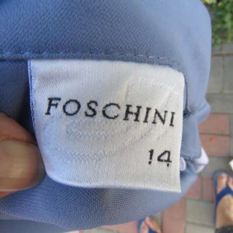 Fabulous light cobalt blue long sleeve jacket in size 38/14 by 'Foshini'. In 100% polyester.