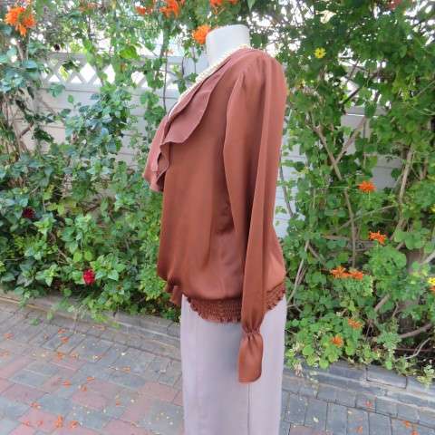 Soft draping golden brown slip over top by 'Oasis' in size 38/14. Blouson style. Double frilled.