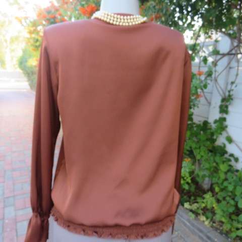 Soft draping golden brown slip over top by 'Oasis' in size 38/14. Blouson style. Double frilled.