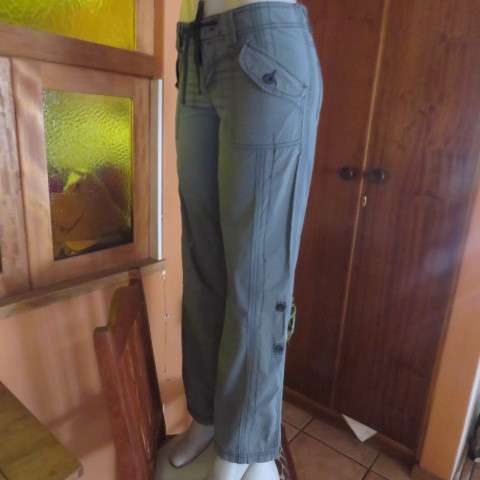 Grey casual pants by `Deniim + Co. In size 32/8. Cargo pockets on front. Tiestring in waist. As new.