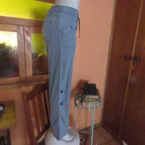 Grey casual pants by `Deniim + Co. In size 32/8. Cargo pockets on front. Tiestring in waist. As new.
