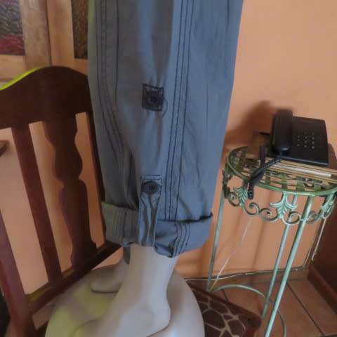 Grey casual pants by `Deniim + Co. In size 32/8. Cargo pockets on front. Tiestring in waist. As new.