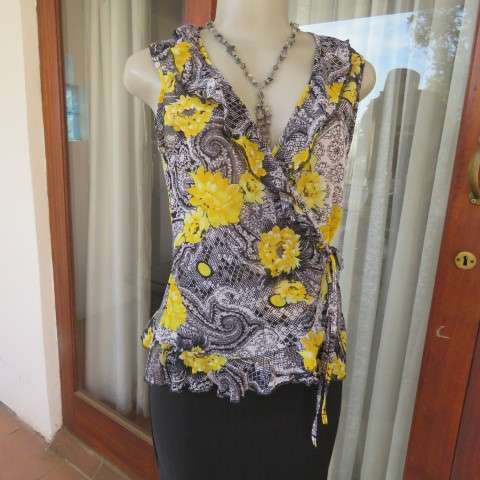Seriously sexy foldover top in 100% nylon. In black,white and yellow pattern.Size 36/12 by KELSO