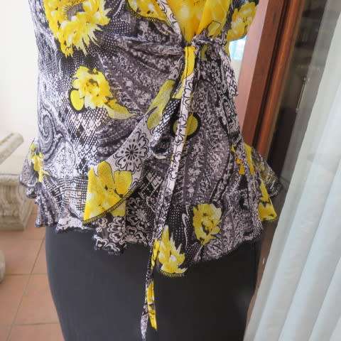 Seriously sexy foldover top in 100% nylon. In black,white and yellow pattern.Size 36/12 by KELSO