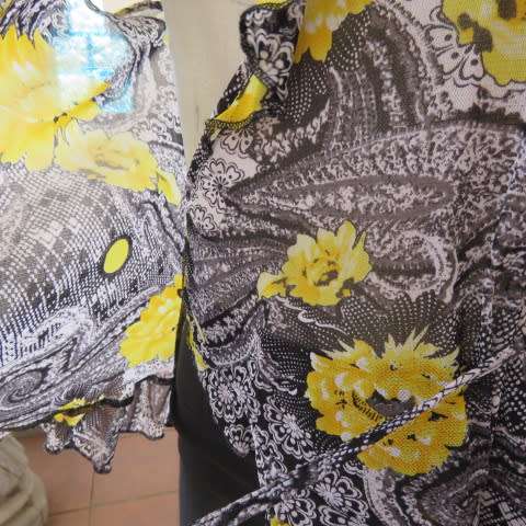 Seriously sexy foldover top in 100% nylon. In black,white and yellow pattern.Size 36/12 by KELSO