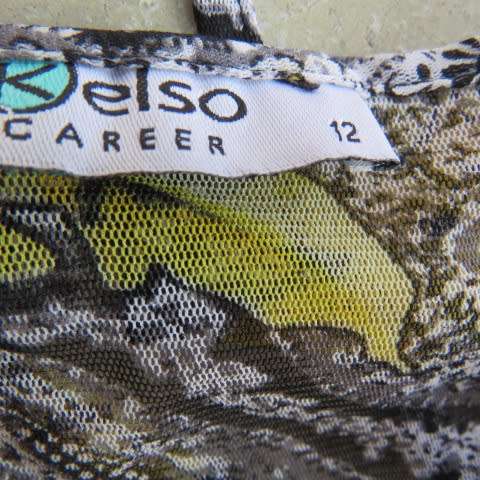 Seriously sexy foldover top in 100% nylon. In black,white and yellow pattern.Size 36/12 by KELSO