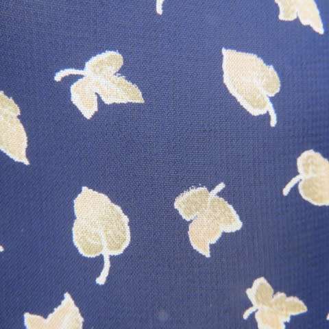 Absolute stunning long sleeve blouse from Germany in size 38/14 in navy with golden leaves. New cond
