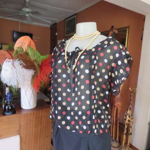 Cool black summer blouson slip over top with polkadots in size 38/14 by MASSUMI.Drawstring neckline