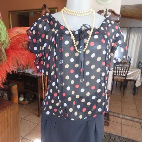 Cool black summer blouson slip over top with polkadots in size 38/14 by MASSUMI.Drawstring neckline