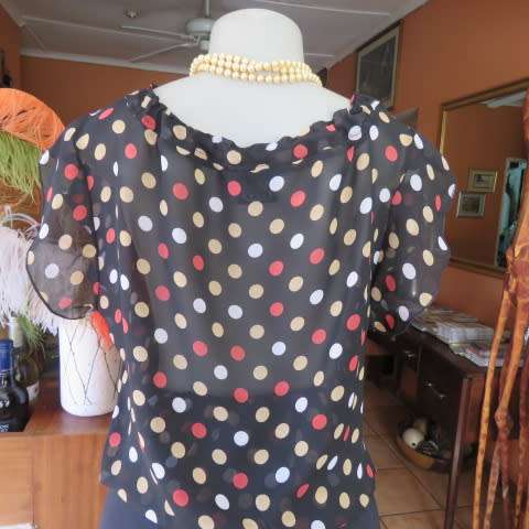 Cool black summer blouson slip over top with polkadots in size 38/14 by MASSUMI.Drawstring neckline